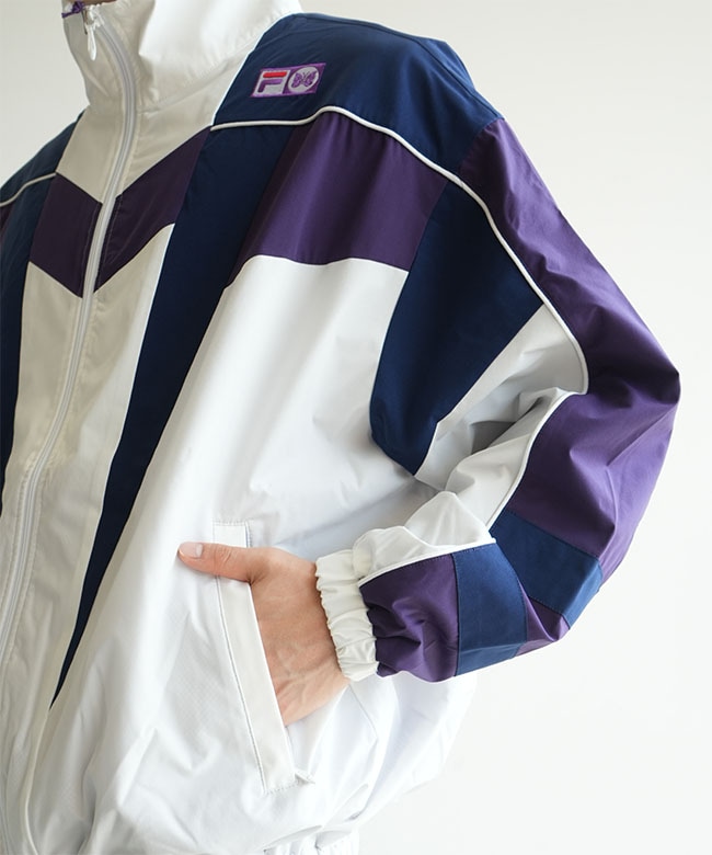 NEEDLES(ニードルズ) × FILA(フィラ) Star Cut Over Sized Windbreaker