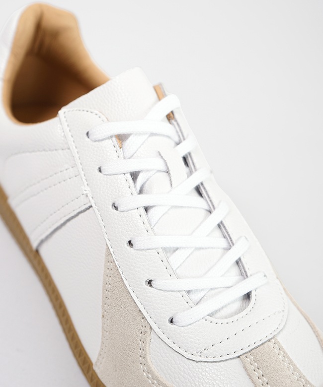 REPRODUCTION OF FOUND - White German Army Trainer