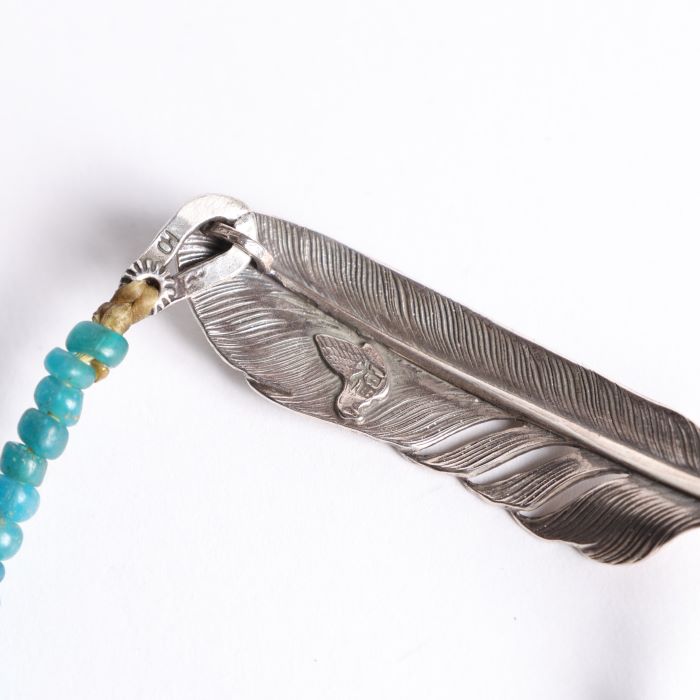WHEEL FEATHER BRACELET