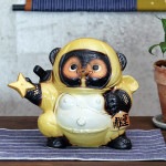 信楽焼きたぬき　手裏剣忍者たぬき　ニンジャ狸　陶器タヌキ 黄 ［ta-0382]|たぬき