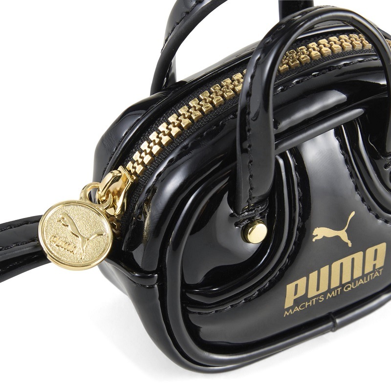 PUMA 26SP PUMA 1976 GRIP BAG KEYCHAIN PUMA BLACK-ARCHIVE GOLD 092598-05