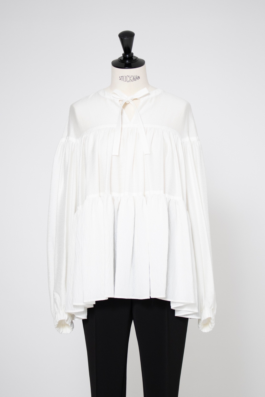 Curensology シアーティアードブラウス Curensology（カレンソロジー）の「Curensology(カレンソロジー