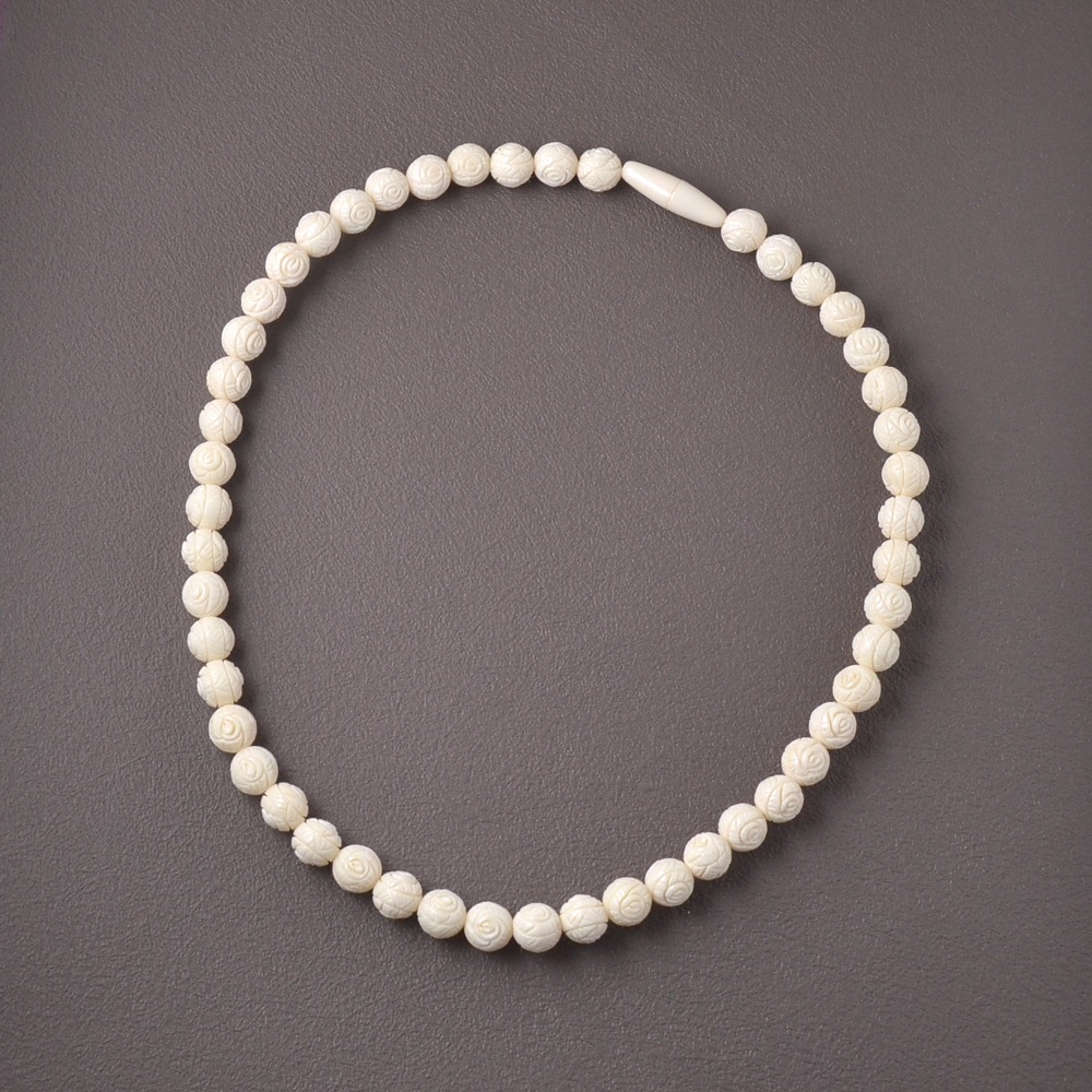 カウボーン カービング丸珠 ネックレス