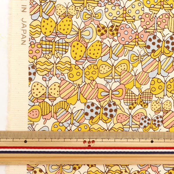数量5から】 生地 『ツイルプリント 密集ちょうちょ イエロー