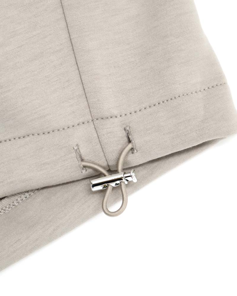 ダンボールポンチ裾ドロスト入りフーディーブルゾン