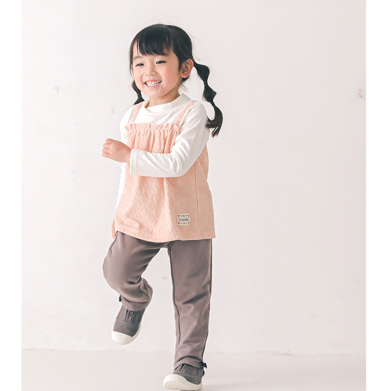 子供服 パンツ ウズランド リボン フリル テーパード 10分丈 (80-130cm)【Uzuland】 女の子 キッズ ベビー ボトムス 長ズボン ポケット ガーリー かわいい おしゃれ 秋物 80cm 90cm 95cm 100cm 110cm 120cm 130cmポイント消化